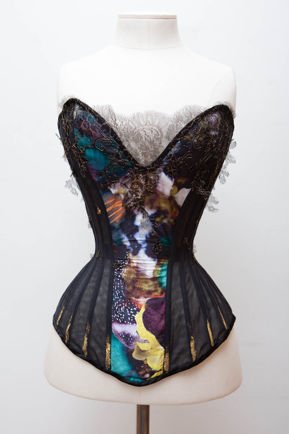 Mink-trimmed recycled patchwork Louis Vuitton corset with sequins,  Swarovski crystals, and gold sequi…